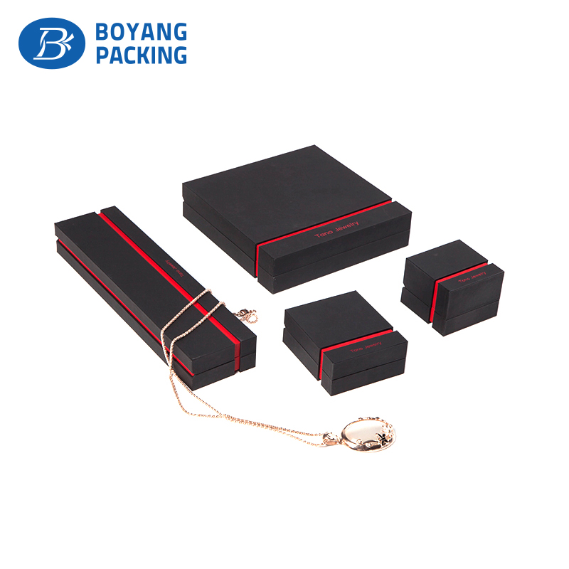 Close black plastic packaging boxes factory