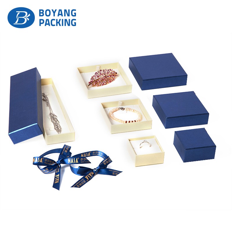 A set of custom cardboard jewelry boxes